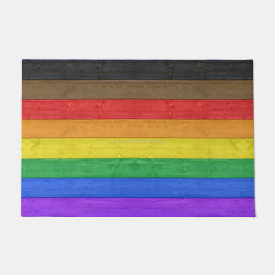 Felpudo Bandera de orgullo gay inclusiva de SlipperyJoe's