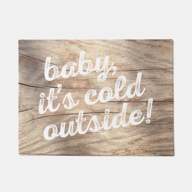 Felpudo ¡bebé, es exterior frío! en fondo de madera ligero (Anverso)