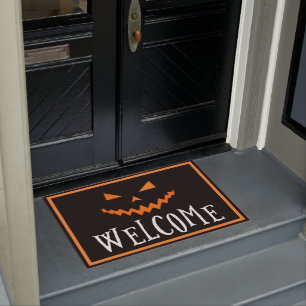 Felpudo Bienvenida a la fantasmagórica cara de calabaza n