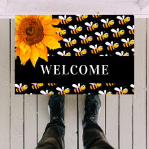 Bienvenida del girasol de las abejas negras