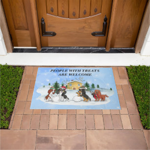 Felpudo Cavalier King Charles Spaniels construyendo un muñ