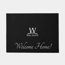 Felpudo de las propiedades inmobiliarias de W