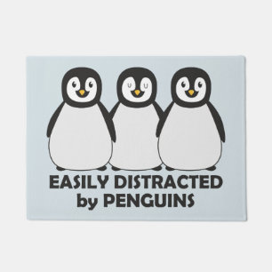 Felpudo Distraído fácilmente por los pingüinos