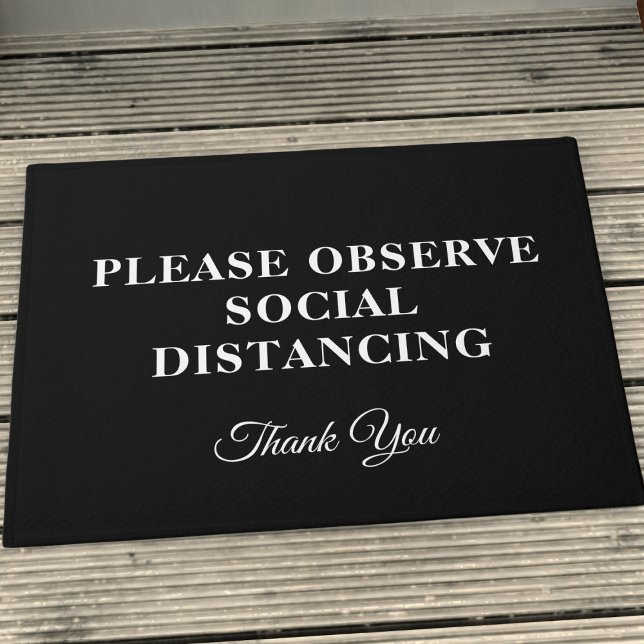 Felpudo Doormat de distanciamiento social blanco y negro a (A special doormat to remind everyone to keep their distance in style. Who said safety can't be chic?)