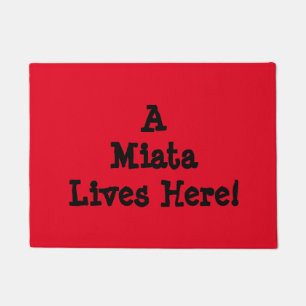 Felpudo Doormat de Miata: ¡"Un Miata vive aquí! "
