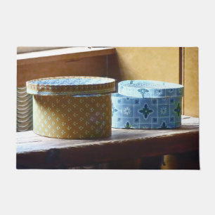 Felpudo Dos cajas Gorras