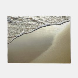 Felpudo el doormat de la playa