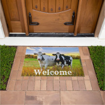 El par de vacas en la bienvenida pastelera