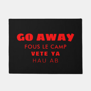 Felpudo Entre lejos en cuatro idiomas antisociales