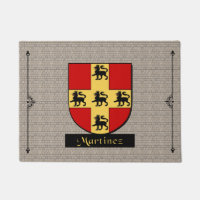 Escudo histórico de Martínez sobre el adoquín
