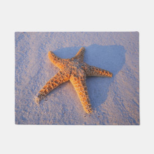 Felpudo Estrellas de mar en la arena blanca