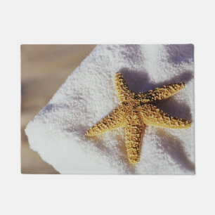 Felpudo Estrellas de mar en una toalla