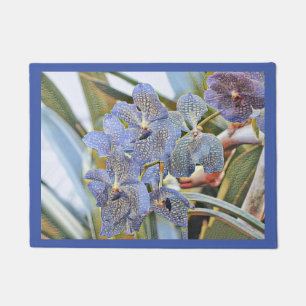 Felpudo Flores de orquídeas de color lavanda azul