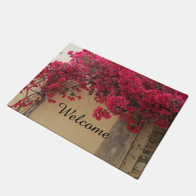 Felpudo Flores rojas en un viejo edificio (Angular)