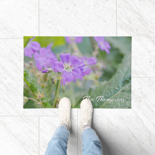 Felpudo Foto de flor silvestre de geranio violeta con apel