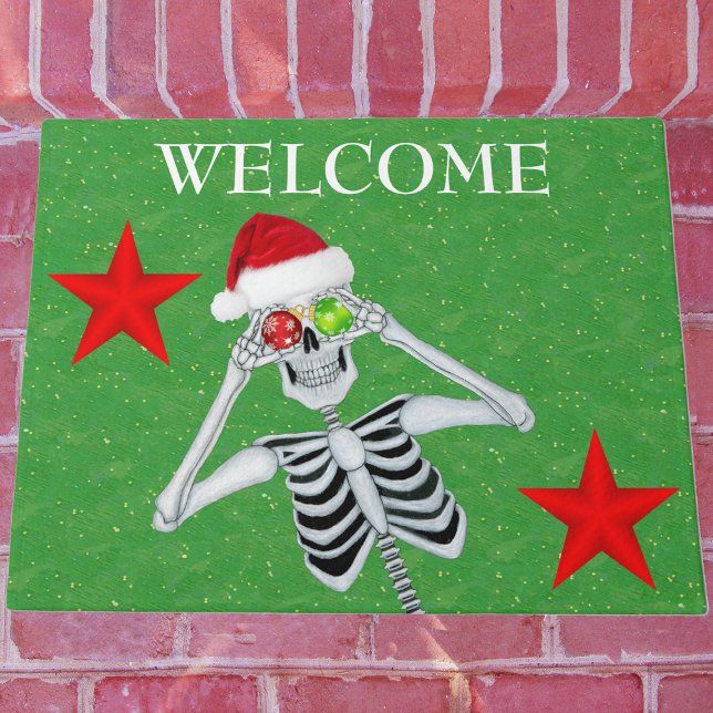 Felpudo Funny Skeleton Ornament Eyes Santa Hat Stars Green (fun Christmas skeleton Santa Hat ornaments red stars on green welcome outdoor mat.)