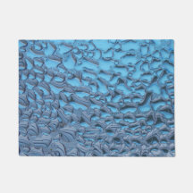 Gotas de lluvia suaves en vidrio azul