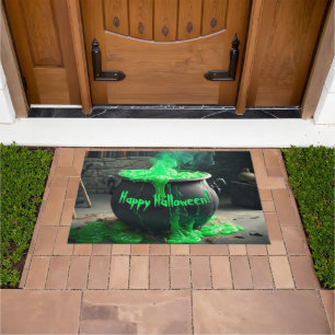 Felpudo Halloween de Cauldron, una bruja torpe