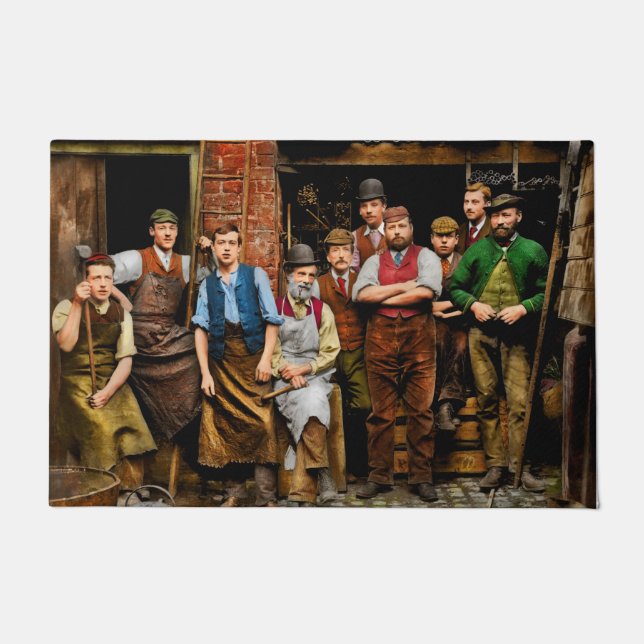 Felpudo Herrero - Los Ironmongers de Maidenhead 1900 (Anverso)