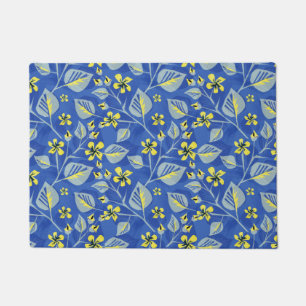 Felpudo Las bromas con hojas y flores.