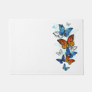 Felpudo Morfo y monarca de las mariposas voladoras