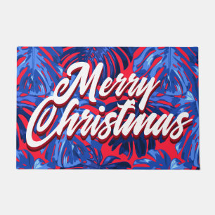 Felpudo Navidades de las hojas tropicales rojas de azul fe