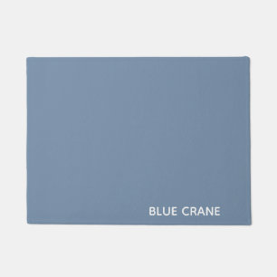 Felpudo Nombre azul del color de la grúa azul