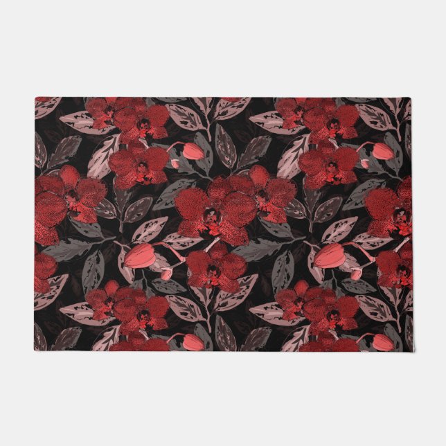 Felpudo orquídeas rojas sobre negro. (Anverso)