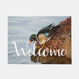 Felpudo Pato de madera en la orilla