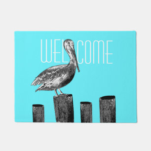 Felpudo Pelícano costero en la recepción del embarcadero