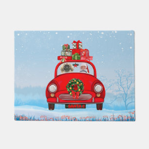 Felpudo Perro pequinés en coche con Papá Noel