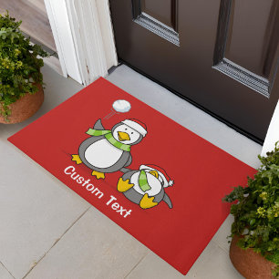 Felpudo Pingüinos lanzando bolas de nieve en Navidad