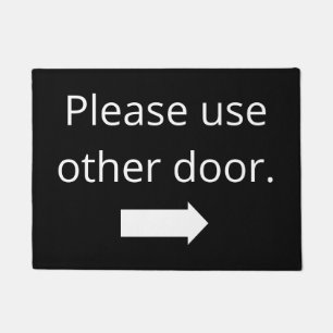 Felpudo Por favor, use otra puerta. Doormat de flecha der