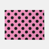 Pos de polka negro sobre rosa