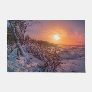 Felpudo Puesta de sol sobre la costa del mar de nieve
