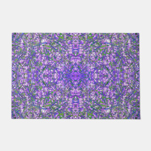 Felpudo Resumen del patrón Kaleidoscope en verde y púrpura