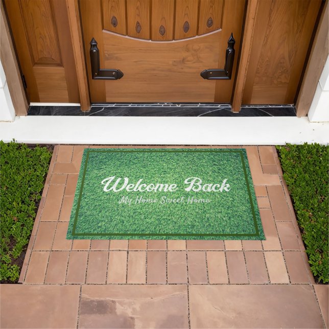 Felpudo Saludos de bienvenida de césped verde (Exterior)