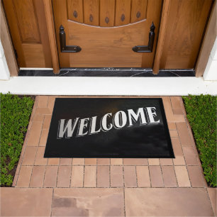 Felpudo señal de bienvenida en la puerta principal