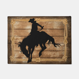 Felpudo Silhouette Cowboy en un maldito caballo de bronce