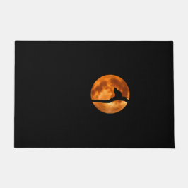 Felpudo Silueta de un gato negro en un árbol