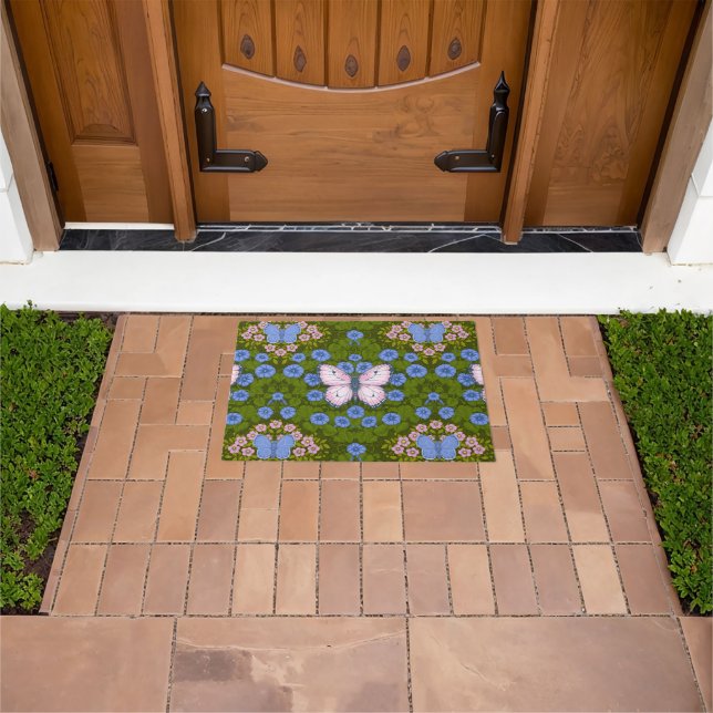 Felpudo Simetría de mariposas y flores, azul y rosa (Exterior)