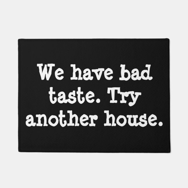 Felpudo Tenemos mún gusto.  Intente otra casa (Anverso)