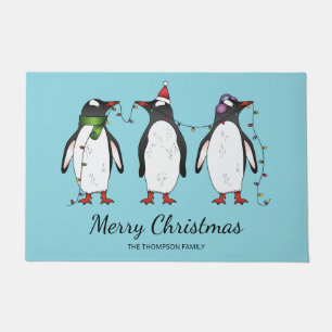 Felpudo Tres pingüinos navideños festivos con texto person