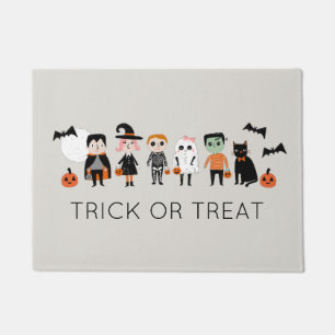 Felpudo Trick o Treat a los niños lindos con disfraces