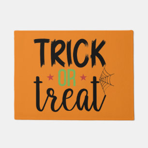 Felpudo Truco o truco en la decoración navideña de Hallowe