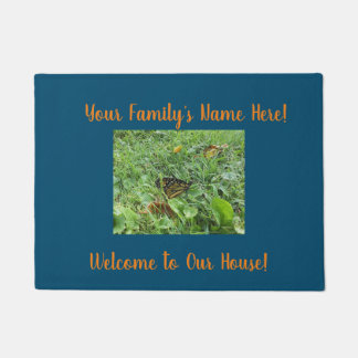 Felpudo Una mariposa monarca