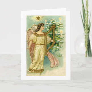 Festiva Ángel con la arpa en la tarjeta del árbol de