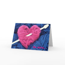 Corazón de lana suave con tarjeta de saludo de agu