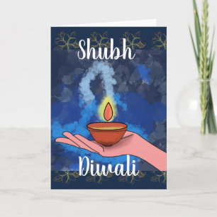 Festiva Diya en la mano Diwali saluda tarjeta de vacacione