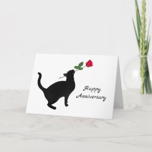 Festiva Gato negro con tarjeta de aniversario de rosa roja